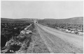 "8.4 miles from Lander, showing section of road over low level." - NARA - 292837.tif